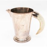 A 20th Century silver plated large serving jug, with horn handle, stamped to base R.H.V &Co., Silver