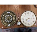 Three clocks. Spares or repair. 1. A French style wall clock with single train movement. Large brass