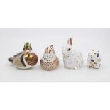 Four Royal Crown Derby paperweights with gold stoppers and boxes including a farmyard hen, rabbit,