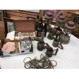 A collection of vintage Tilley lamps, blow lamps, vintage bottles and oil painting box with oil