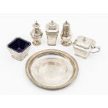 An Art Deco silver three piece condiment set, hallmarked by Mappin & Webb, Birmingham, 1930, two