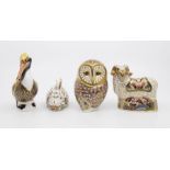 Three Royal Crown Derby gold stopper paperweights including an owl, pelican, Imari ram, along with a