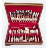 A mid 20th Century canteen of cutlery in a mahogany box