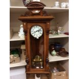 A late 19th Century / early 20th Century Vienna 8 day wall clock, mahogany case