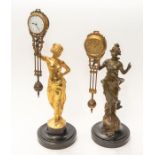 2 Diana swinging clocks. 1. Cast lady with swinging clock and pendulum. 14" high. Name in the