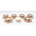 Six Royal Crown Derby 1128 Imari pattern tea cups, saucers with matching sugar bowl, all first