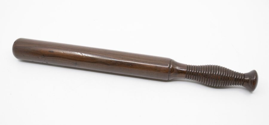 An early to mid 20th Century truncheon, mahogany