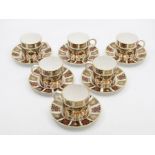 A collection of six Royal Crown Derby 1128 Imari pattern coffee cans and saucers, first quality