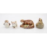 Four Royal Crown Derby paperweights including an owlet, cat, otter and golden hen, all with gold