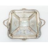 A Victorian style silver plate engraved two handled tray together with four glass hor d'oeurves