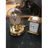 An early 20th Century brass French carriage clock, AF, along with a mid 20th Century anniversary