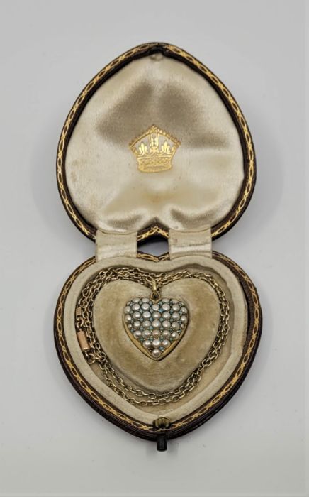 A Victorian precious yellow metal, pearl and turquoise heart pendant in fitted case, the heart shape