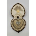 A Victorian precious yellow metal, pearl and turquoise heart pendant in fitted case, the heart shape