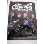 The Osmonds - A lot of signed / Autographed items. Including a Signed 2006 Tour Programme with 2