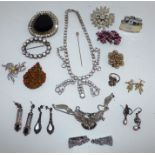 Collection of costume jewellery and 3 pairs of silver earings .
