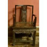 A Chinese Guangdong late 19th century hardwood armchair, open rectangular back, pierced carved