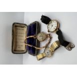 Three wristwatches in 9ct gold (one on a stainless steel strap). Early 20th century. (3)