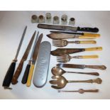 2 sets of silver plated fish servers, 6 glass ink bottles , some knives and steels , a silver handle