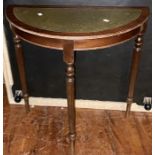 A 20th century mahogany console table, demi-lune shape, leather and gilt inlay surface top, raised