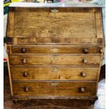 A George III and later oak crossbanded and mahogany bureau, fall front enclosing fitted interior
