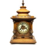 An early 20th century oak cased14 Day strike Mantle Clock by A Wurttemberg H.A.C , model no 306,
