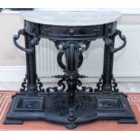 A large and impressive late 19th century cast iron Coalbrookdale hall stand, demi-lune marble top,
