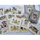 Collection of First World War postcards with fabric embellishments to include regimental badges;