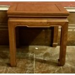 A Chinese camphor stool/low table, rectangular form inset floating panel on an indented frieze,
