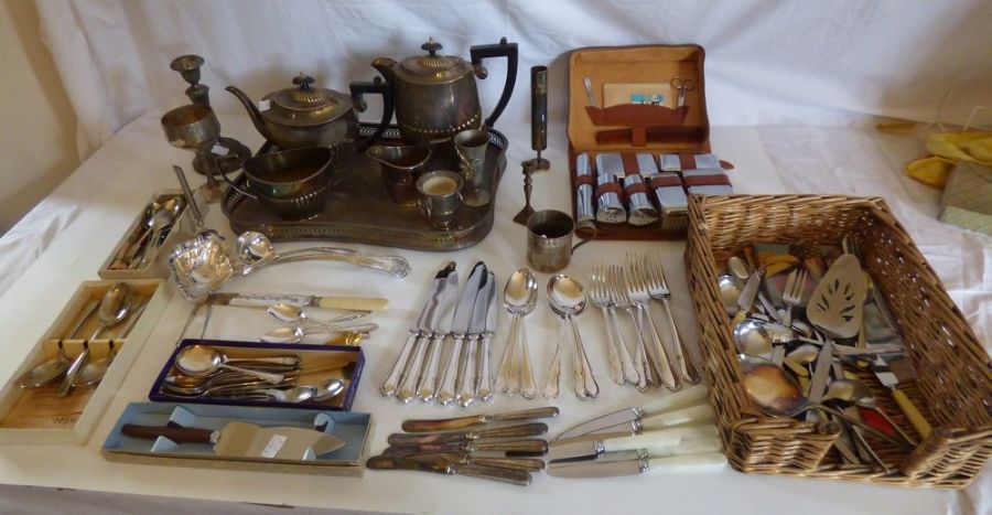 Quantity of silver plated items , to include a tea and coffee service on a tray , a mens travel case