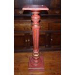 A 20th Century painted jardinière stand, empire design, rectangular top on a reeded column on a