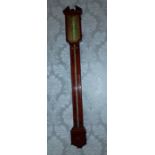 A George III mahogany stick barometer with broken pediment, silvered dial by Ronchetti,