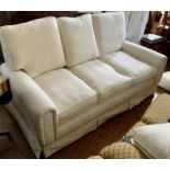 Two similar recent grand three and four seater sofas, cream upholstery.