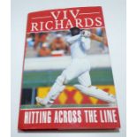 Signed copy of Viv Richards " Hitting across the line "