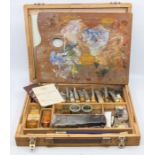 A mid 20th Century Windsor & Newton Artist's box, interior with palette, oil colours, bottles of
