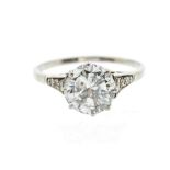 A 1930's diamond and platinum solitaire ring, the round brilliant cut diamond weighing approx 2.