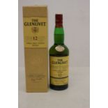 A Bottle Of Glenlivet 12 Year Old Single Malt Scotch