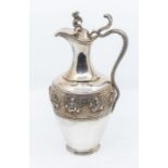 A 19th Century Anglo-Indian "Swami-Ware" Madras silver claret jug, plain baluster body chased with a