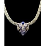An 18ct gold diamond and sapphire necklace in the form of a rams head, the horns set with round
