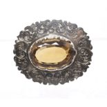 A Victorian Scottish  citrine and silver brooch, the centre set with an oval citrine approx 20 x