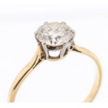 A diamond and 18ct gold solitaire ring, comprising a claw set round brilliant cut diamond weighing