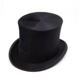 A vintage James Lock & Son silk top hat, interior measurements 21 x 17cm together with leather