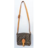 louis Vuitton- a mini Cartouchiere monogramed cross body/shoulder bag, signature monogrammed