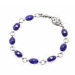 A Faberge diamond and  blue enamel 18ct white gold limited edition bracelet, comprising reversible