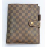 Louis Vuitton- a vintage brown check Damier Ebene Agenda case, signature check cross grain canvas,