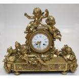 A good French mantel clock, circa 1860, decorated with cherubs, flora and fauna, heavily decorated