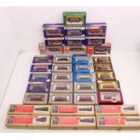 OO Gauge: A collection of assorted boxed OO Gauge, rolling stock and coaches to comprise: Dapol,