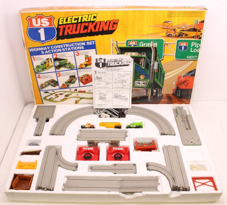 Tyco: A boxed Tyco, US 1, Electric Trucking: Highway Construction Set, original box, lid taped.