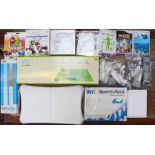 Nintendo: A collection of assorted Nintendo Wii items to include: console, boxed games, Wii Fit, Wii