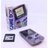Nintendo: A boxed Nintendo Gameboy Color, clear purple, CGB-001. Untested for working order. With