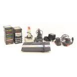 Atari: An unboxed Atari 2600 console with power lead and joystick controllers, together with a